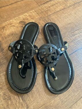 Tory Burch Black Patent Miller Logo Thong Sandals with Gold Accents